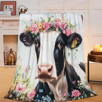 Cow with Pink Flower Blanket: A Cattle Portrait with a Floral Crown
