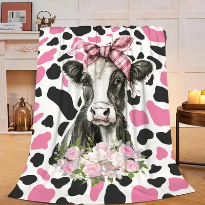Cow Print with Pink Bow Blanket featuring a spotted cow