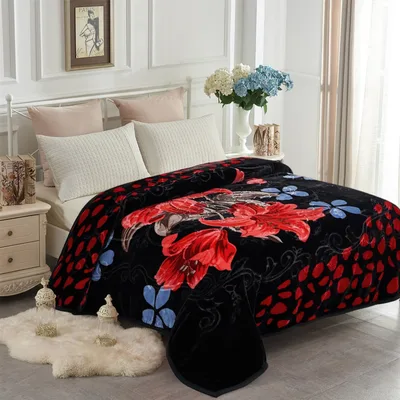 Black Floral Blanket with Bold Red Blooms and Blue Accents