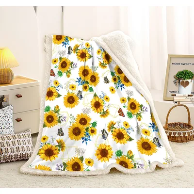 Sunflowers and Butterflies Blanket featuring yellow blooms