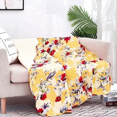 Yellow Floral Hummingbirds Quilt Blanket featuring vibrant red flowers