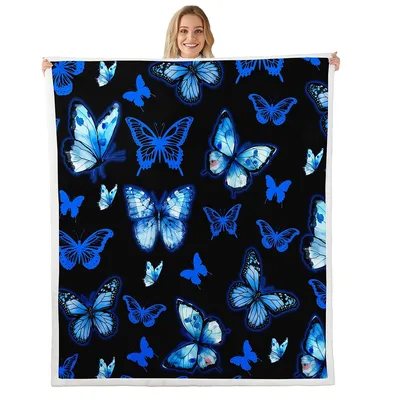 Blue Butterflies on Black Blanket: Glowing Insect Pattern