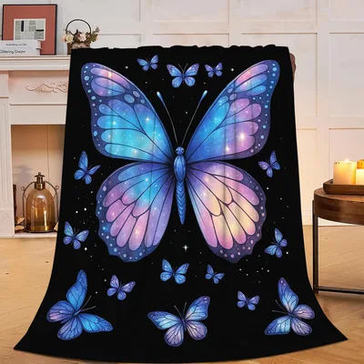 Blue Butterfly on Black Blanket: Cosmic Wings Design