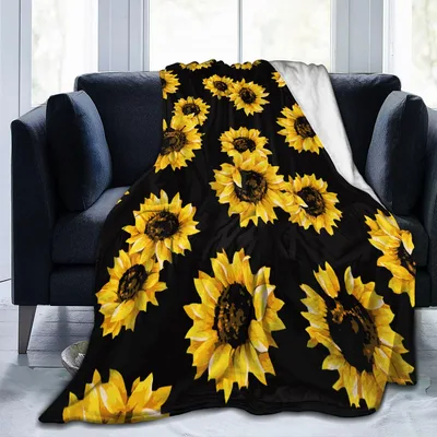 Sunflowers on Black Blanket: Bright Floral Design for Cozy Days