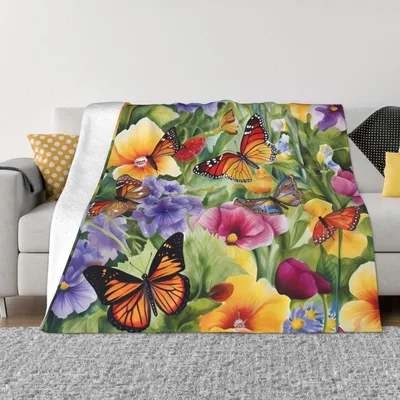 Butterflies and Colorful Flowers Blanket featuring vibrant monarchs