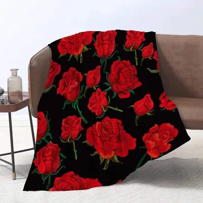 Red Roses on Black Blanket: Bold Floral Throw for Dark Interiors