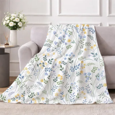 Blue and Yellow Floral Blanket: A Delicate Garden Print for Your Sofa