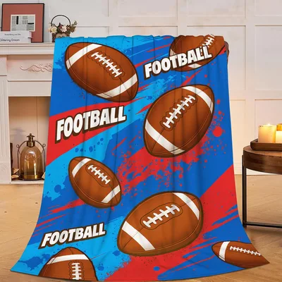 Football Pattern on Blue Blanket: Fuzzy Sports Design for Fans