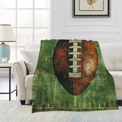 Vintage Football on Grass Blanket: Retro Field Design for Fans