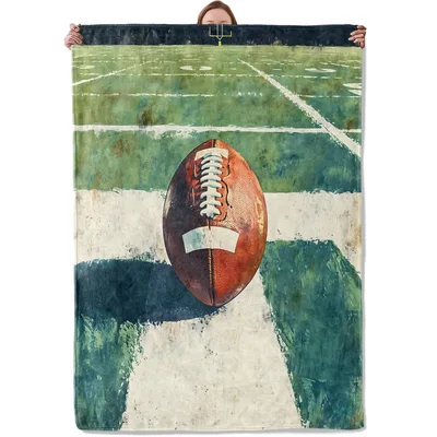 Football on Green Field Blanket: Artistic Football Design for Fans