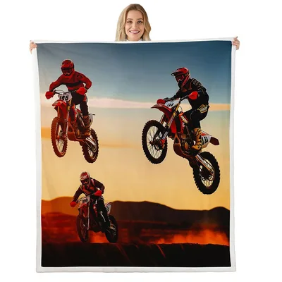 Motocross Riders Jumping Blanket: Dirt Bike Action at Sunset