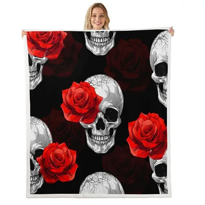 Skulls and Red Roses Blanket featuring detailed gray skulls