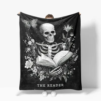 Skeleton Reader with Open Blanket: Gothic Skull and Book Design