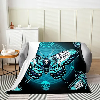 Turquoise Moth with Skull Blanket featuring a large butterfly