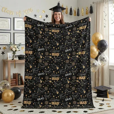 Black Gold Grad Pattern Blanket features mortarboards