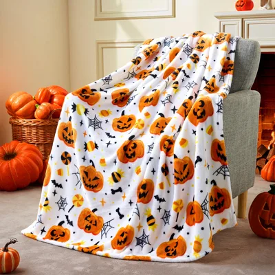 Spooky Pumpkin Candy & Blanket featuring carved pumpkins