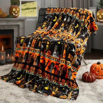Halloween Pumpkins Graveyard Blanket featuring spooky jack-o-lanterns