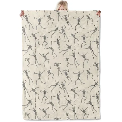 Cream Dancing Skeletons Pattern Blanket featuring quirky bone poses