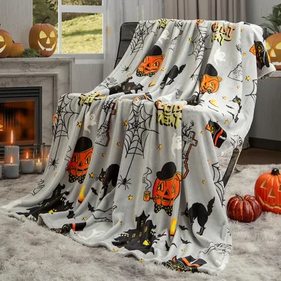 Halloween Pumpkins Cats Blanket featuring trick-or-treat text