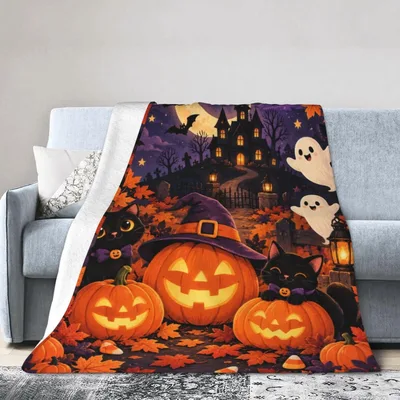 Halloween Pumpkins and Black Blanket: Spooky Cats and Jack-o'-Lanterns