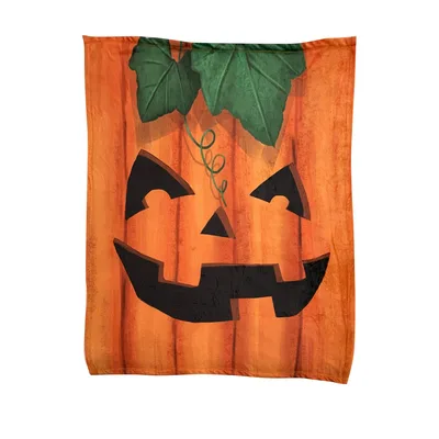 Smiling Jack-O-Lantern Face Blanket: Festive Halloween Pumpkin Design
