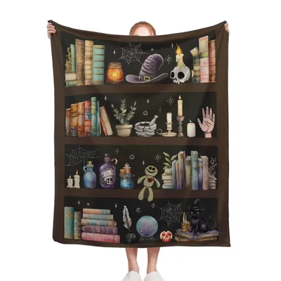 Witch Bookshelf with Skulls Blanket featuring vintage spellbooks