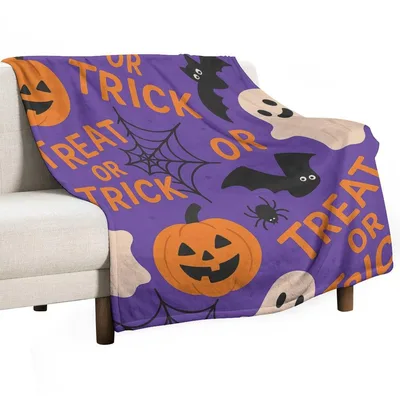 Trick or Treat Ghost Blanket featuring orange text
