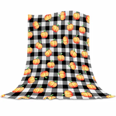 Pumpkins on Buffalo Plaid Blanket featuring orange pumpkins