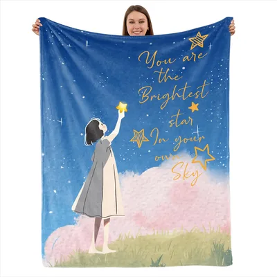 Girl Reaching for Brightest Blanket featuring a girl holding a star