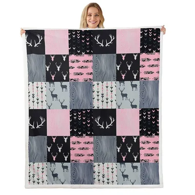 Pink Plaid Deer Antler Blanket featuring a patchwork of deer heads