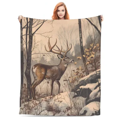 Deer in Forest Blanket: A Majestic Buck in a Winter Woodland Scene
