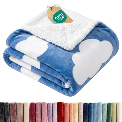 Blue Clouds Pattern Blanket featuring fluffy white cloud shapes