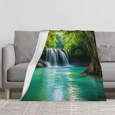 Waterfall in Green Forest Blanket: Lush Nature Scene