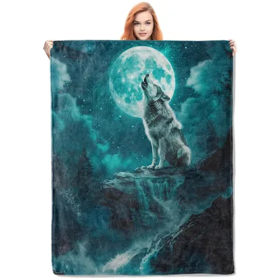 Wolf Howling at Moon Blanket: A Wolf Silhouette Under a Teal Full Moon