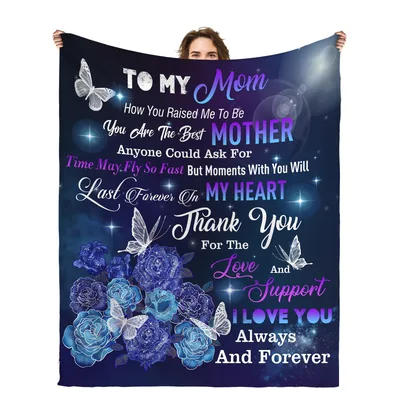 Vintage Rose Blanket features blue roses and butterflies