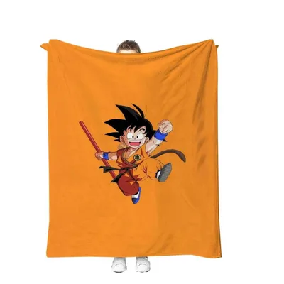 Anime Warrior Boy Blanket: Jumping Goku with Staff on Orange