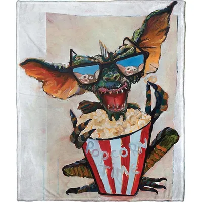 Gremlin Eating Popcorn Blanket features a painted monster