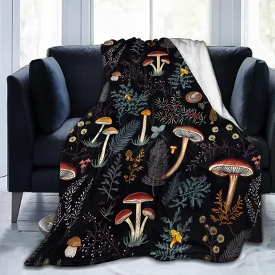 Dark Woodland Mushrooms Blanket featuring detailed red-capped fungi