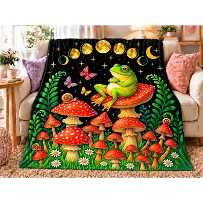 Frog on Mushrooms Moon Blanket features a green frog