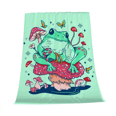 Frog on Mushrooms Art Blanket featuring a relaxed green frog sitting