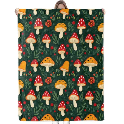 Red Mushrooms and Foliage Blanket: Cozy Forest Toadstool Design
