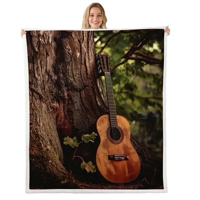 Nature Blanket: Acoustic Guitar Leaning Against a Tree Trunk