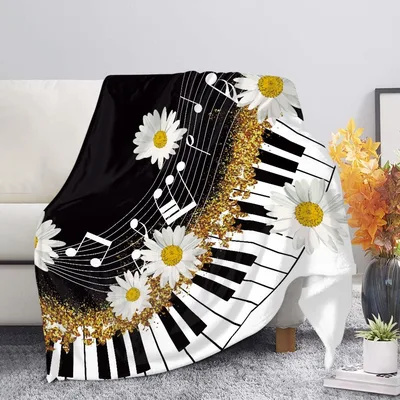 Piano Keys with Daisies Blanket: Floral Music Design for Musicians