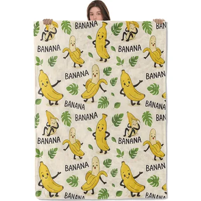 Cartoon Bananas with Leaves Blanket featuring smiling fruit characters