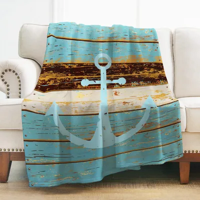 Anchor on Rustic Wood Blanket: Nautical Design for Coastal Homes