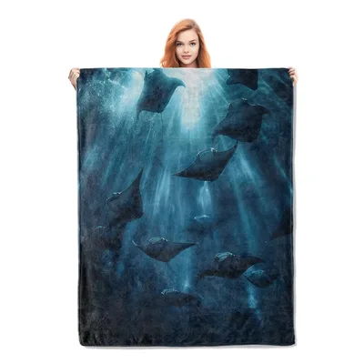 Stingrays Swimming Underwater Ocean Blanket features dark