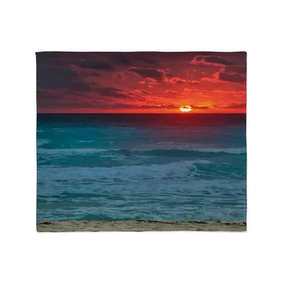 Sunset Over Ocean Beach Blanket: Coastal Sunset Scene