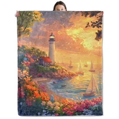 Lighthouse at Sunset Coast Blanket featuring a painted coastal scene