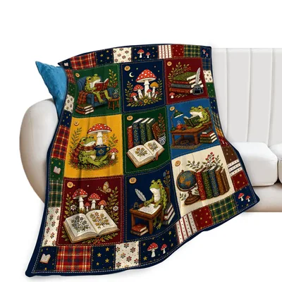 Frog Reading Books Blanket features a patchwork