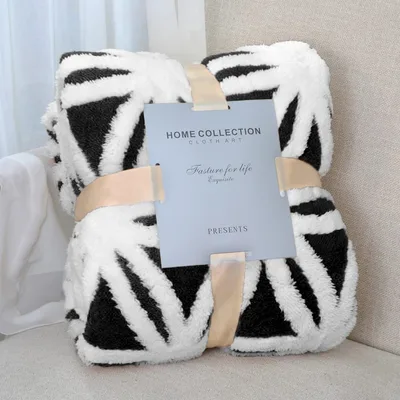 Black and White Geometric Blanket: Bold Lines for Your Sofa